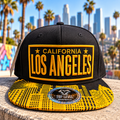 Los Angeles Snapback Hat Black and Yellow with Design on the bill